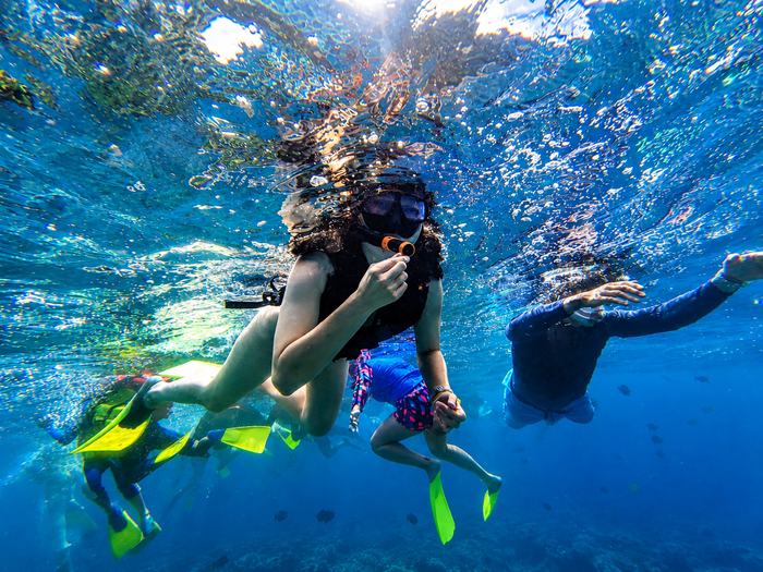 Group of travelers snorkeling together in Nusa Penida